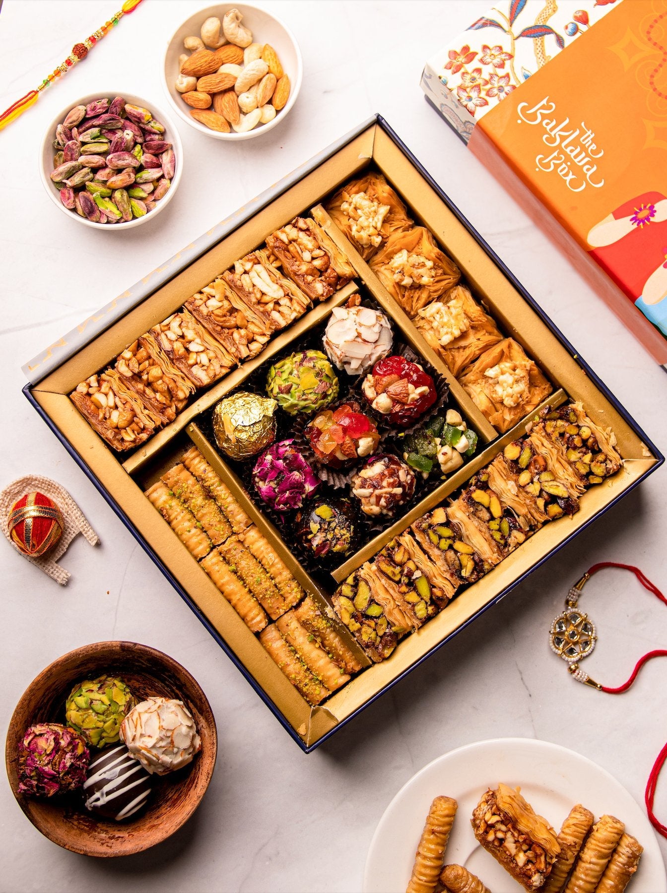 Rakhi Gift Box : Regalia Gift Box with Indian Sweets with 2 sets of rakhi - THE BAKLAVA BOX